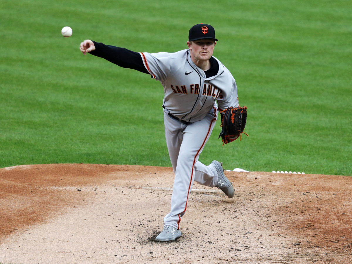 May 17, 2021; Cincinnati, Ohio, USA; San Francisco Giants starting pitcher Logan Webb (62) throws against the Cincinnati Reds during the first inning at Great American Ball Park.
